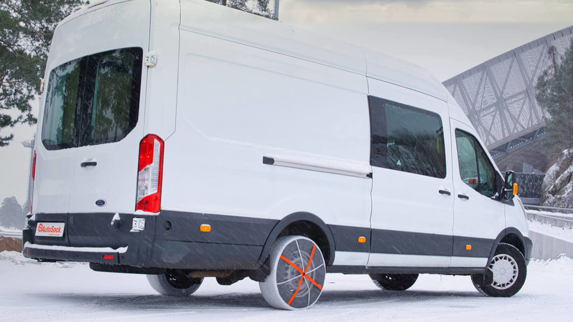 Autosock snow socks fitted to rear wheel drive van 01